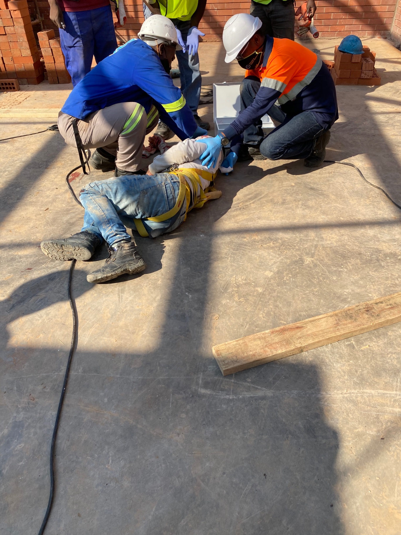Practical first-aid exercise conducted on a construction site