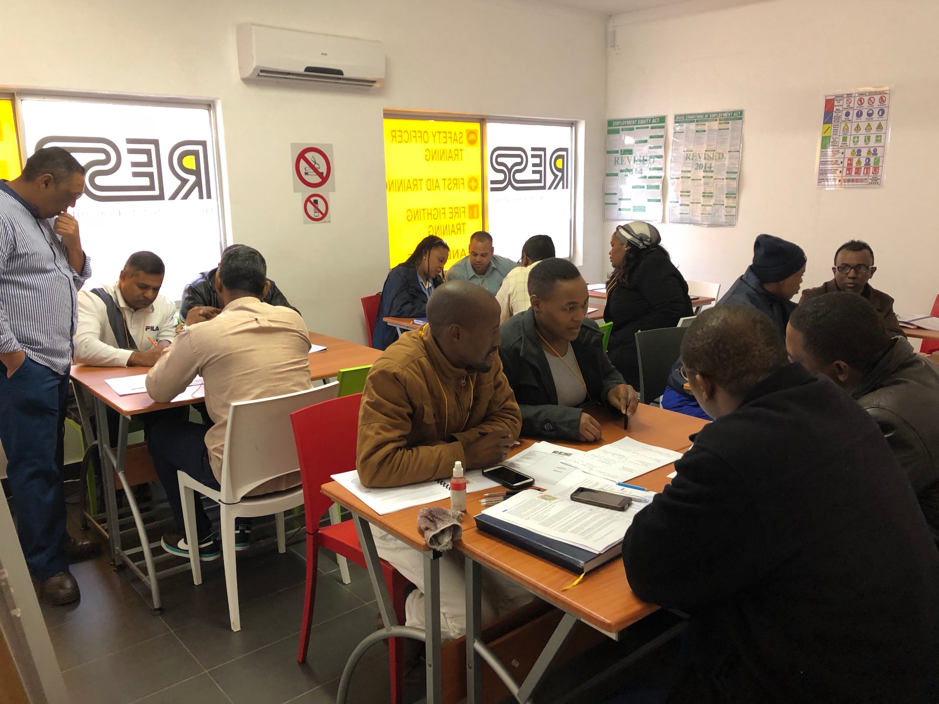 Delegates completing assessments in the RESS training centre