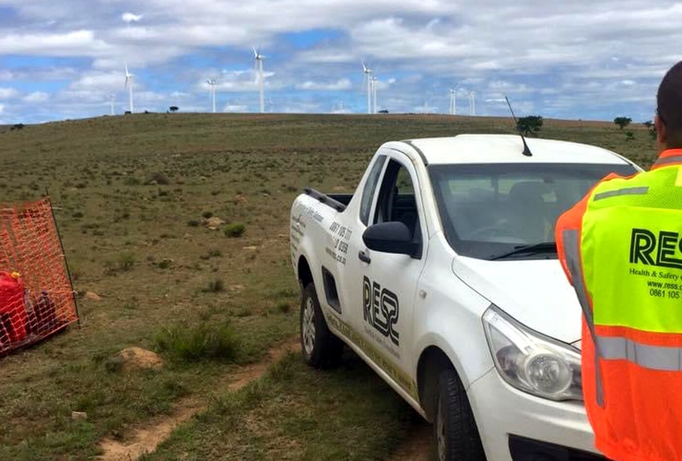 RESS International vehicle and officer at a wind farm site